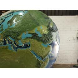 A unique 78 inches (2 meters) diameter relief globe shows the physical features under the oceans.