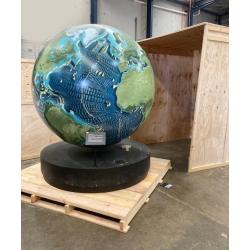 A unique 78 inches (2 meters) diameter relief globe shows the physical features under the oceans.